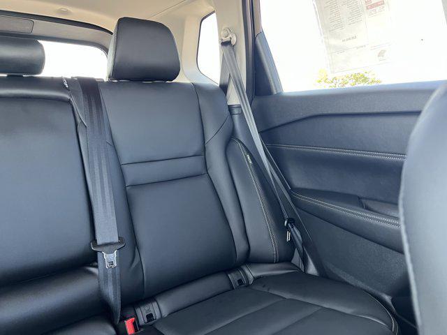 Photo of 2024 Super Black Nissan Rogue