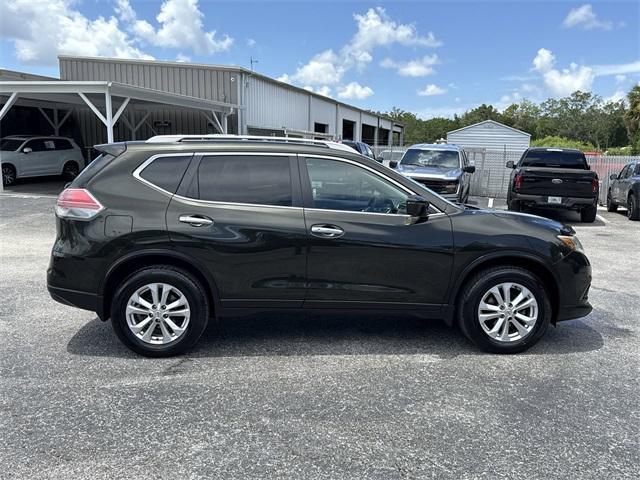Photo of 2016 Midnight Jade Nissan Rogue