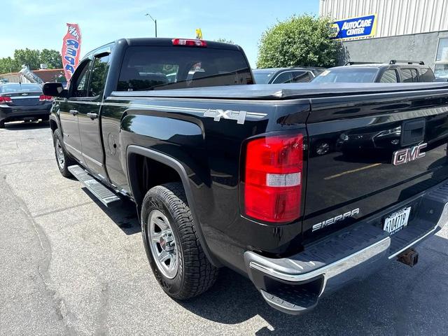 Photo of 2015 Black GMC Sierra 1500
