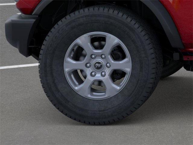 Photo of 2025 Ruby Red Metallic Tinted Clearcoat Ford Bronco