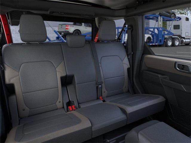 Photo of 2025 Ruby Red Metallic Tinted Clearcoat Ford Bronco
