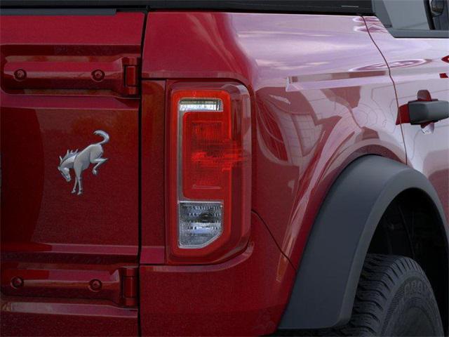 Photo of 2025 Ruby Red Metallic Tinted Clearcoat Ford Bronco
