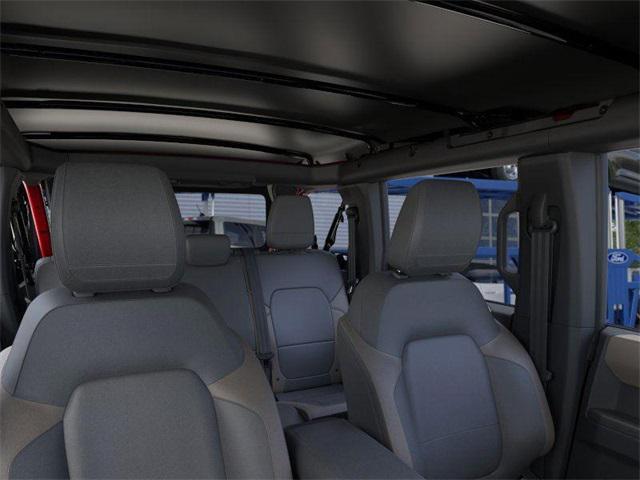 Photo of 2025 Ruby Red Metallic Tinted Clearcoat Ford Bronco