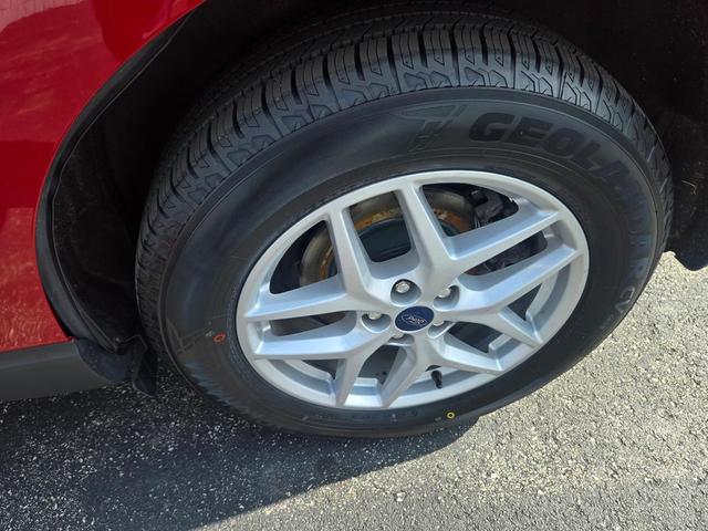 Photo of 2021 Rapid Red Metallic Tinted Clearcoat Ford Edge