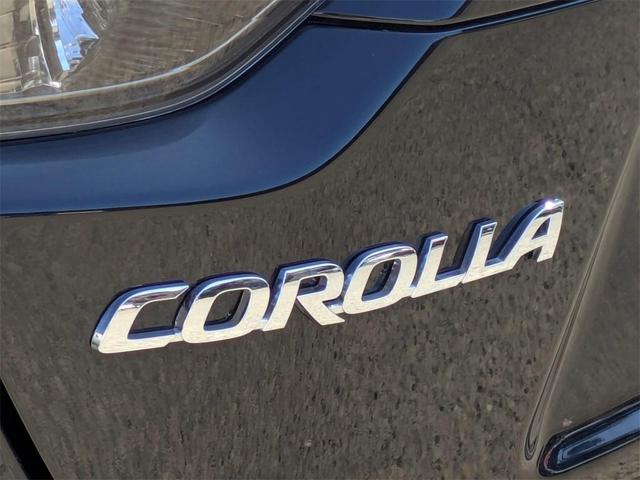 Photo of 2024 Midnight Black Metallic Toyota Corolla Hybrid