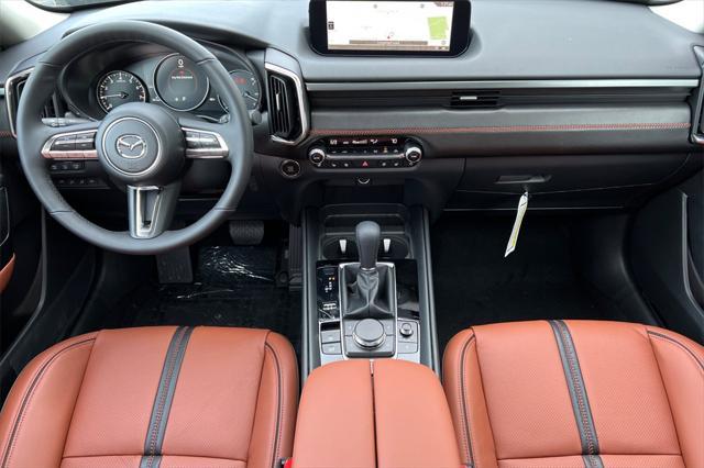 Photo of 2025 Ingot Blue Metallic Mazda CX-50
