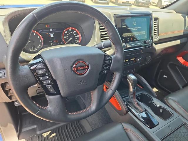 Photo of 2023 Deep Blue Pearl Nissan Frontier