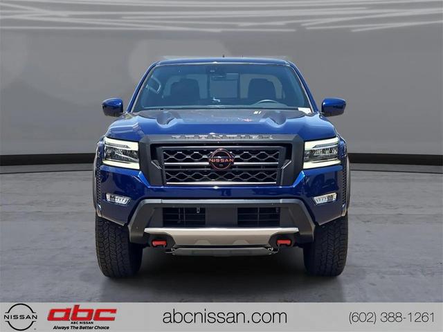 Photo of 2023 Deep Blue Pearl Nissan Frontier