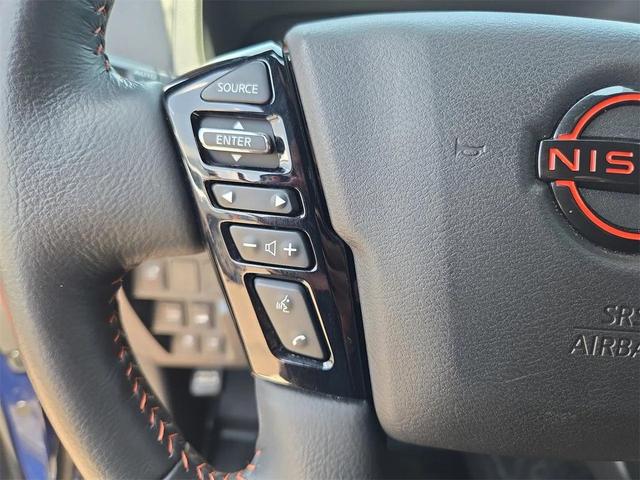 Photo of 2023 Deep Blue Pearl Nissan Frontier