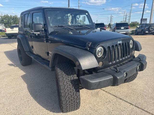 Photo of 2011 Black Clearcoat Jeep Wrangler Unlimited