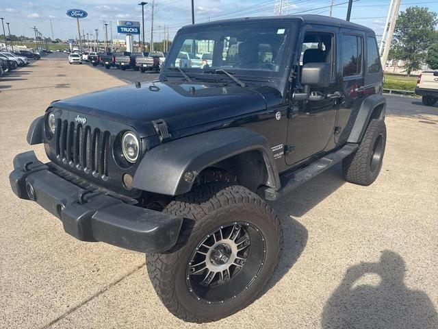 Photo of 2011 Black Clearcoat Jeep Wrangler Unlimited