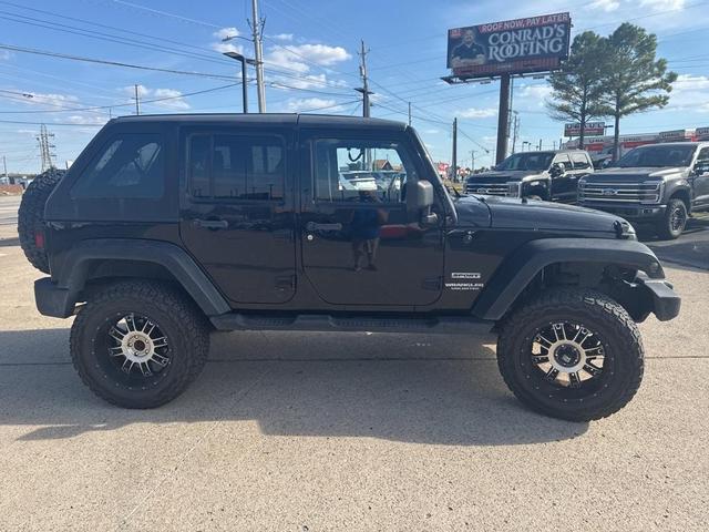Photo of 2011 Black Clearcoat Jeep Wrangler Unlimited