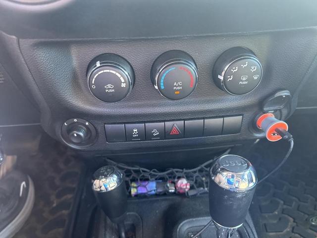 Photo of 2011 Black Clearcoat Jeep Wrangler Unlimited