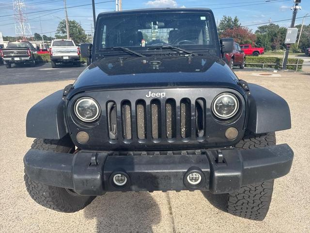 Photo of 2011 Black Clearcoat Jeep Wrangler Unlimited