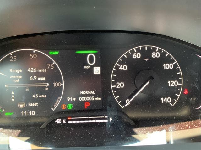 Photo of 2026 Crystal Black Pearl Honda Civic Hybrid