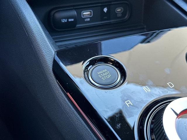 Photo of 2025 Fusion Orange Kia Sportage Plug-In Hybrid