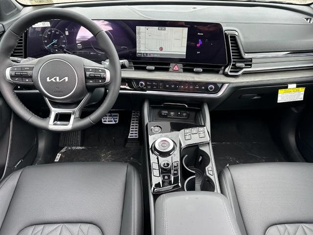 Photo of 2025 Jungle Green Kia Sportage Plug-In Hybrid