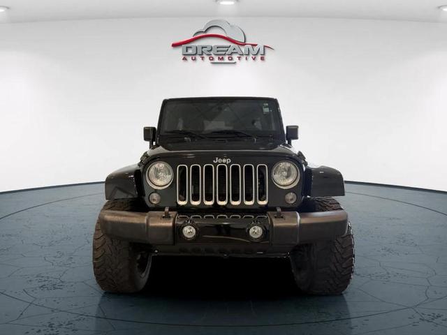 Photo of 2016 Black Clearcoat Jeep Wrangler Unlimited