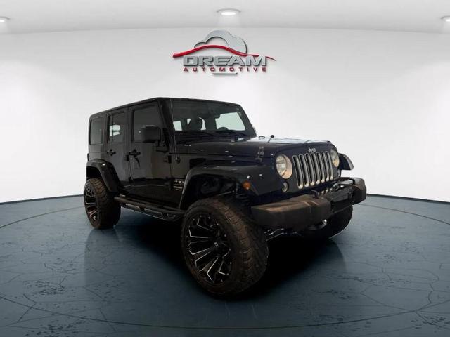 Photo of 2016 Black Clearcoat Jeep Wrangler Unlimited