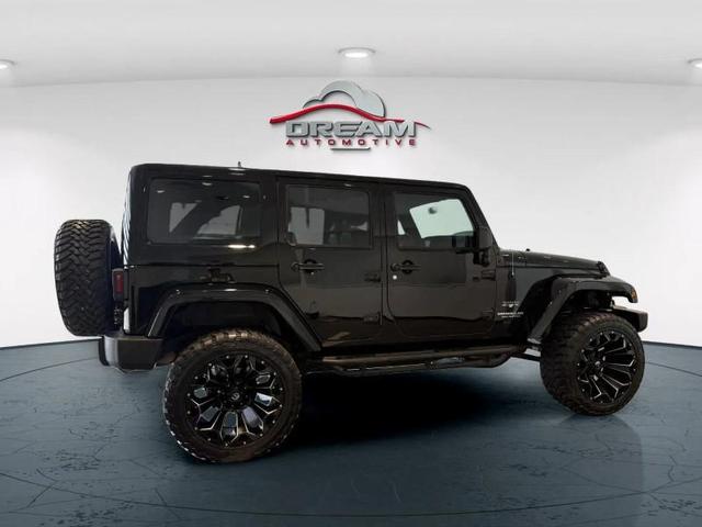 Photo of 2016 Black Clearcoat Jeep Wrangler Unlimited