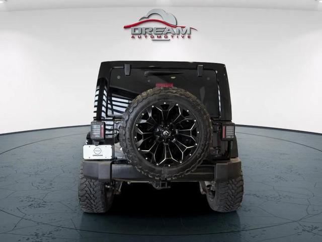 Photo of 2016 Black Clearcoat Jeep Wrangler Unlimited