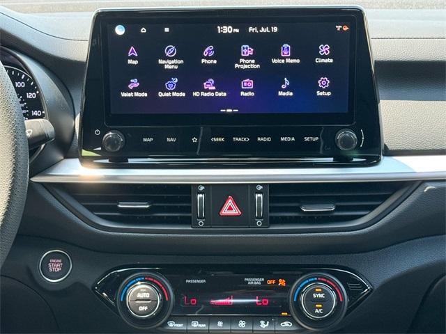 Photo of 2024 Currant Red Kia Forte