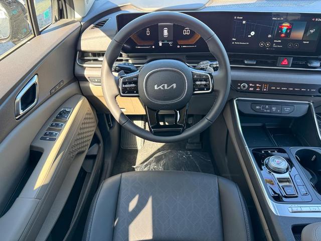 Photo of 2026 Aurora Black Pearl Kia Carnival Hybrid