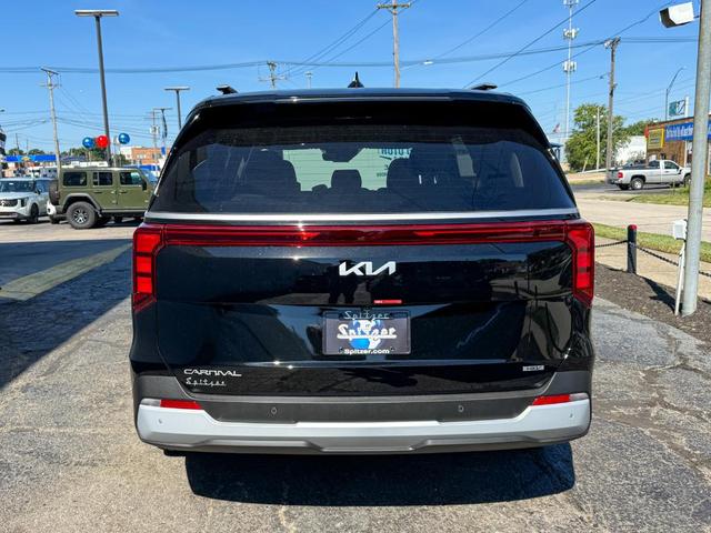 Photo of 2026 Aurora Black Pearl Kia Carnival Hybrid