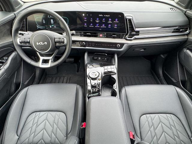 Photo of 2025 Jungle Green Kia Sportage Plug-In Hybrid