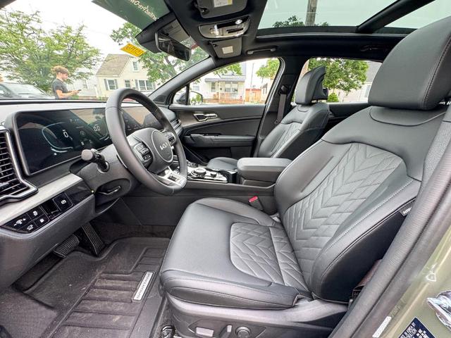 Photo of 2025 Jungle Green Kia Sportage Plug-In Hybrid