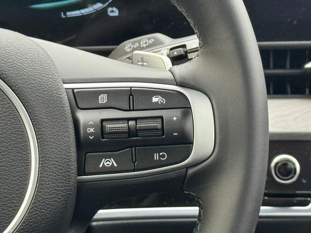Photo of 2025 Jungle Green Kia Sportage Plug-In Hybrid