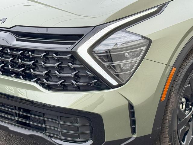 Photo of 2025 Jungle Green Kia Sportage Plug-In Hybrid