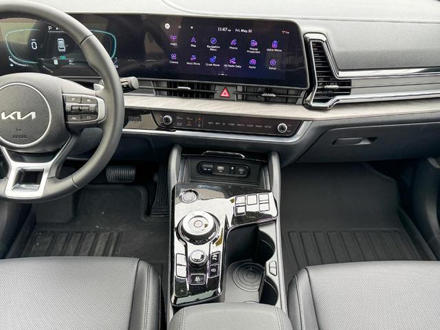 Photo of 2025 Jungle Green Kia Sportage Plug-In Hybrid