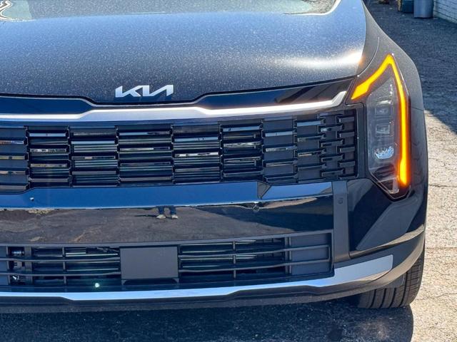 Photo of 2026 Ebony Black Kia Sportage