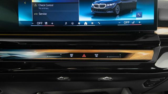 Photo of 2025 Black Sapphire Metallic BMW i5