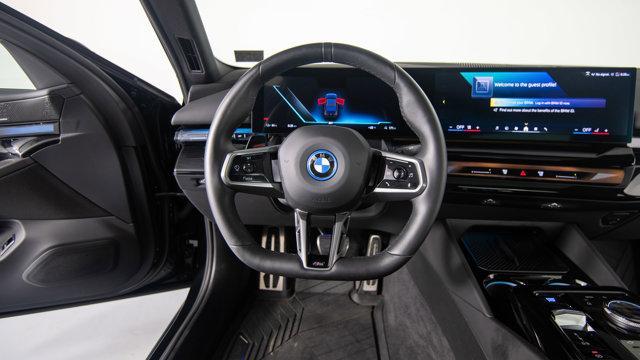 Photo of 2025 Black Sapphire Metallic BMW i5