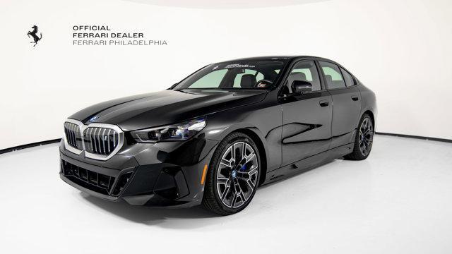 Photo of 2025 Black Sapphire Metallic BMW i5