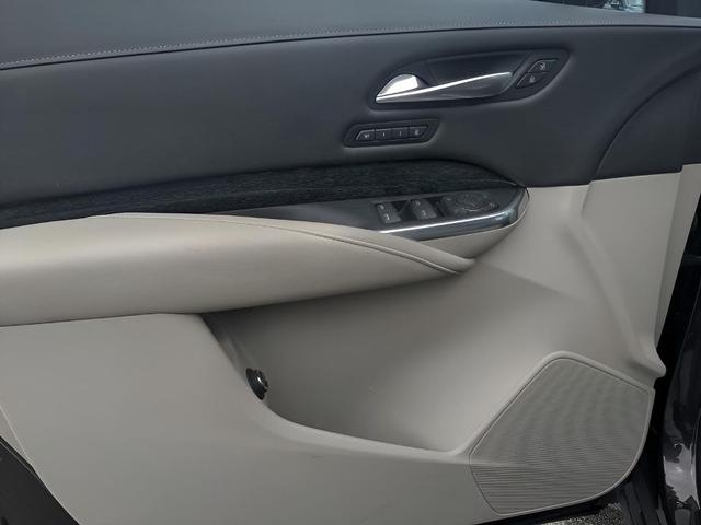 Photo of 2021 Garnet Metallic Cadillac XT4