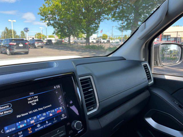 Photo of 2024 Glacier White Nissan Frontier