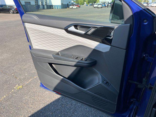 Photo of 2024 Dusk Blue Metallic Volkswagen Taos