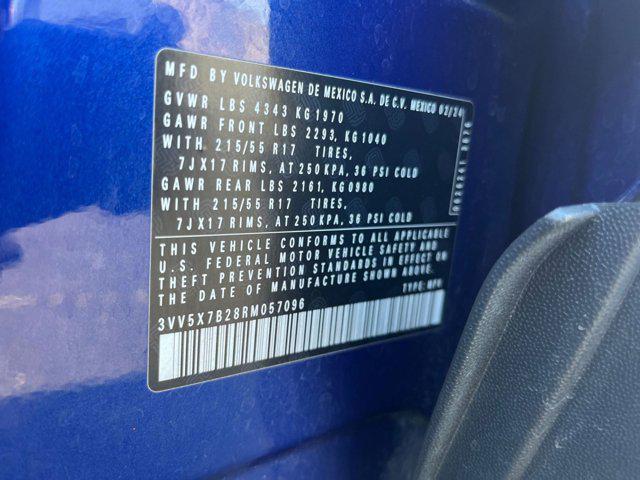 Photo of 2024 Dusk Blue Metallic Volkswagen Taos