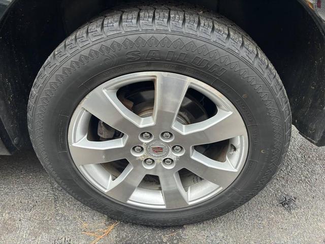 Photo of 2009 Black Cadillac SRX