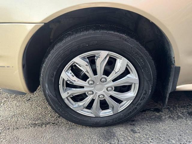 Photo of 2004 Gold Oldsmobile Alero