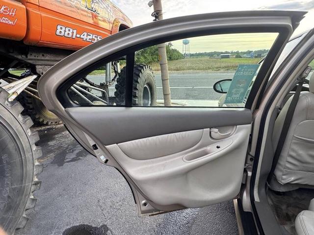 Photo of 2004 Gold Oldsmobile Alero