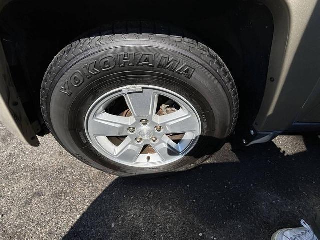 Photo of 2010 Light Sandstone Metallic Clearcoat Jeep Liberty