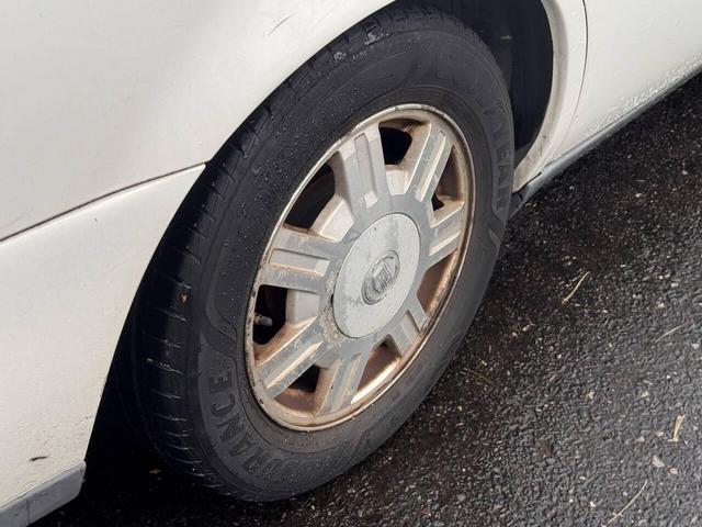 Photo of 2005 Cotillion White Cadillac DeVille