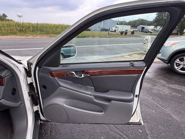 Photo of 2005 Cotillion White Cadillac DeVille