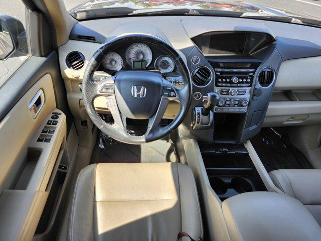 Photo of 2013 Dark Amber Metallic Honda Pilot