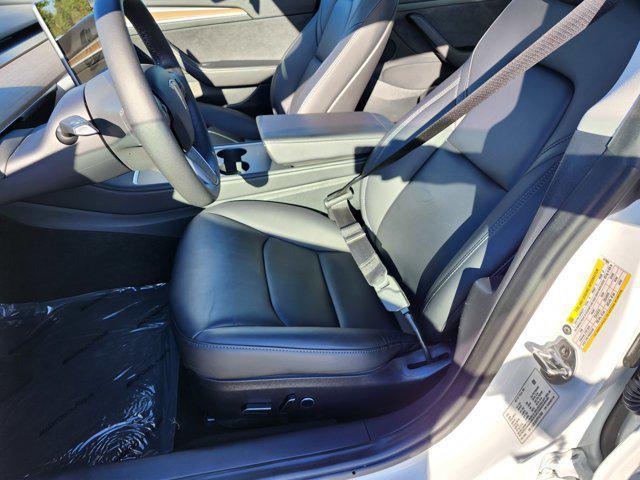 Photo of 2023 Pearl White Multi-Coat Tesla Model 3