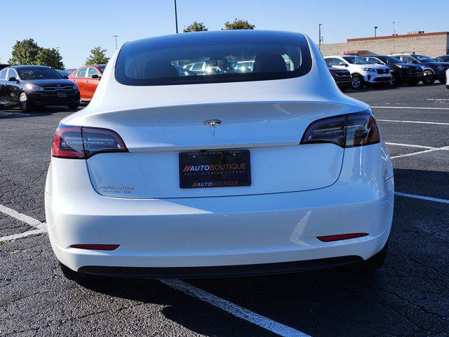 Photo of 2023 Pearl White Multi-Coat Tesla Model 3